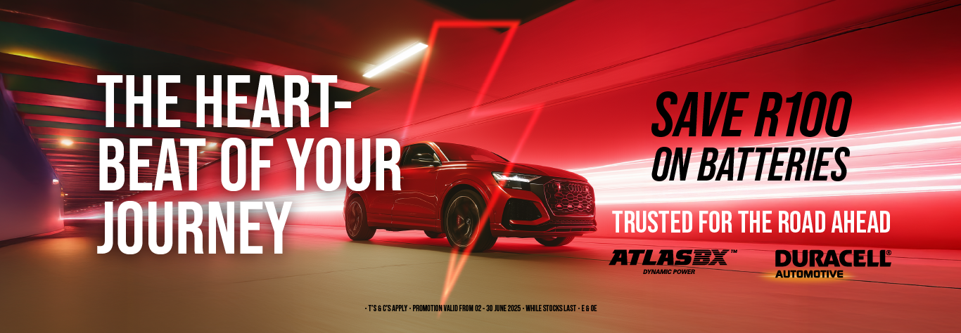 battery campaign banner: an SUV driving though a red lit tunnel